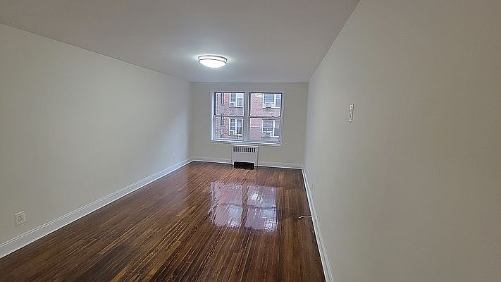 1st image of 33-34 77th St