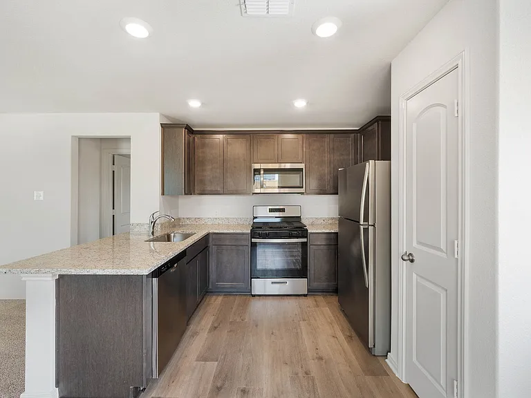 The kitchen has energy efficient appliances.