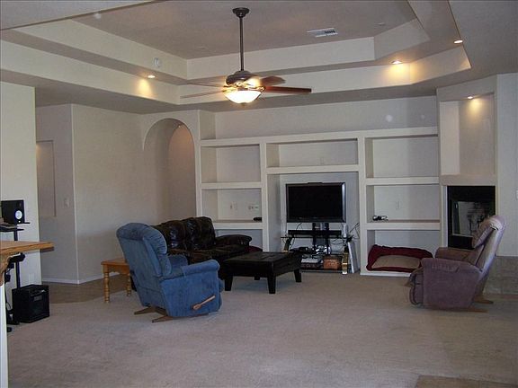 Open Living Room has lots of natural light and high ceilings