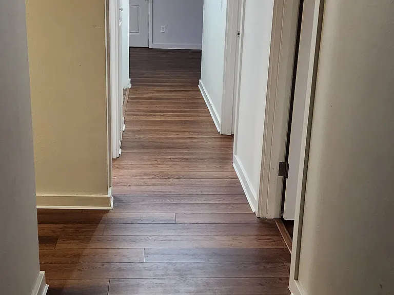 This floor plan has two bedrooms side by side and one bedroom down a separate hall.