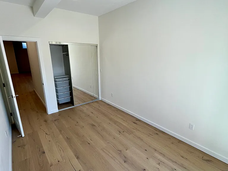 Second Bedroom with built-in Elfa closet system