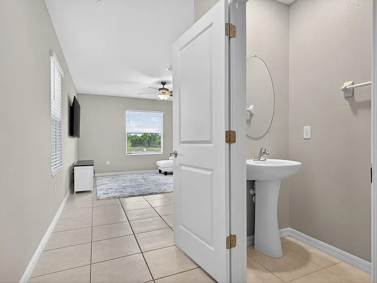 9909 Calypso Orchid Ct — Photo 49