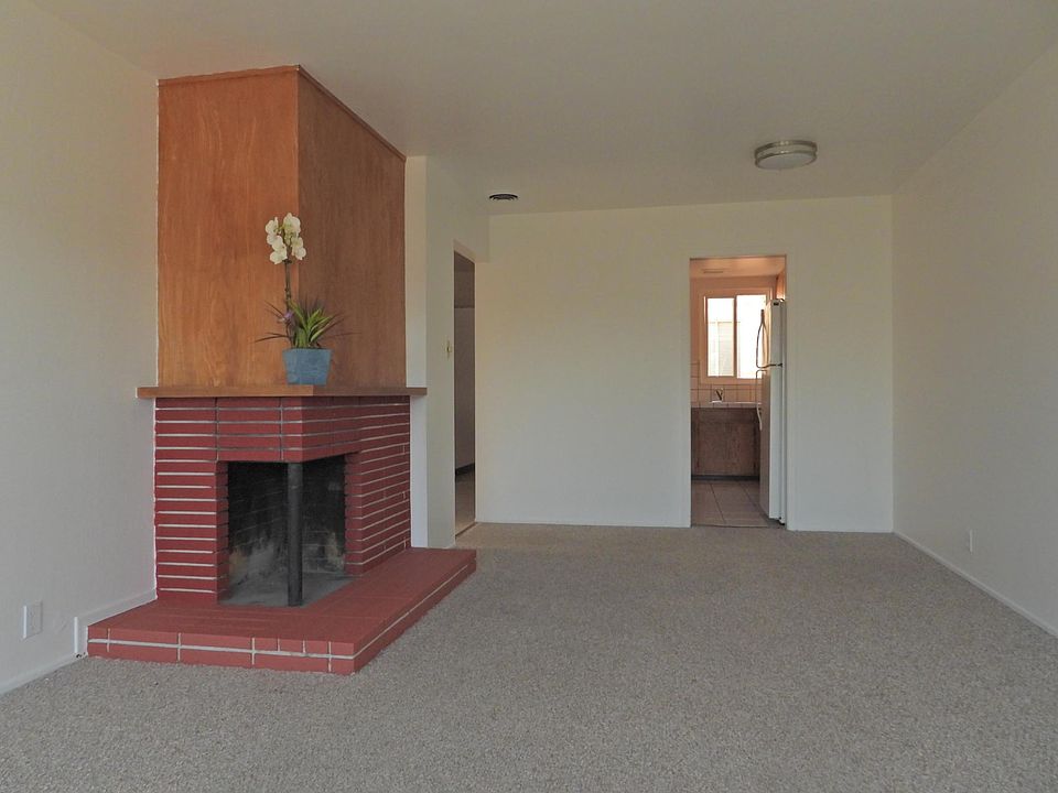 Living/Dining Area and Wood Burning Fireplace