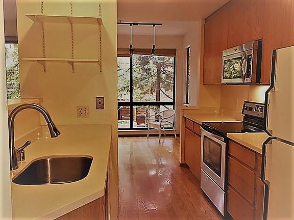 Kitchen with newer oven, dishwasher, micro wave oven, and fr