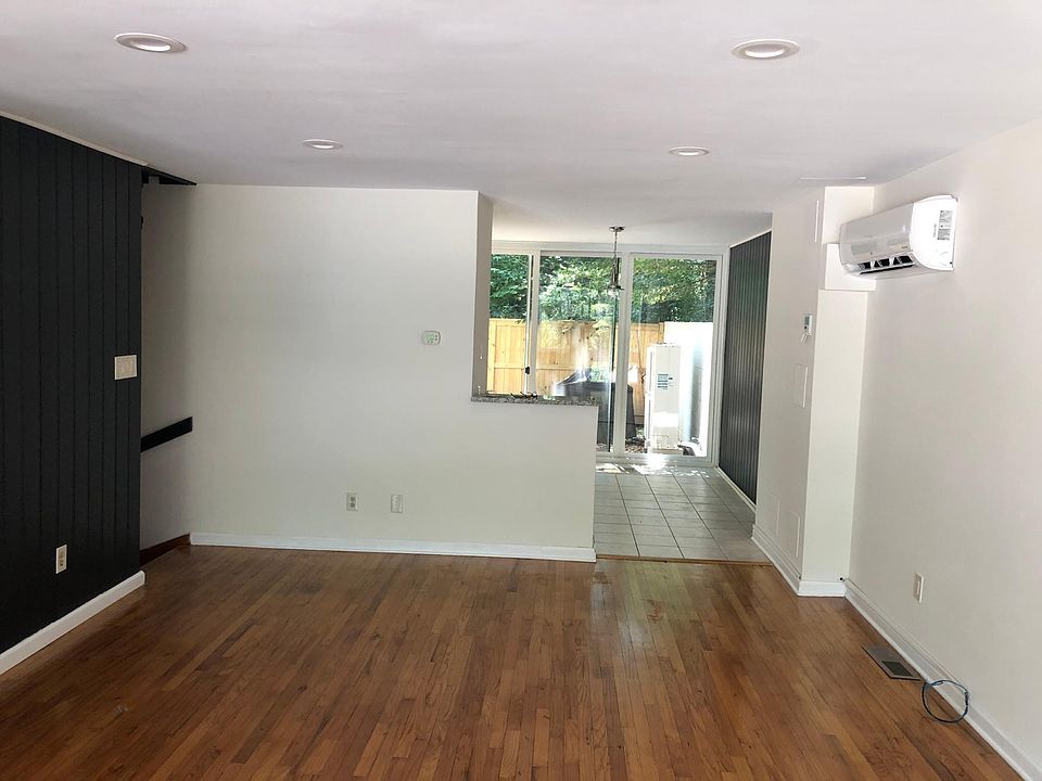 View from LVG room to dining area and back yard.