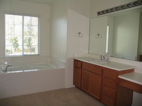 Master bath with his and her sinks and seperate shower/tub