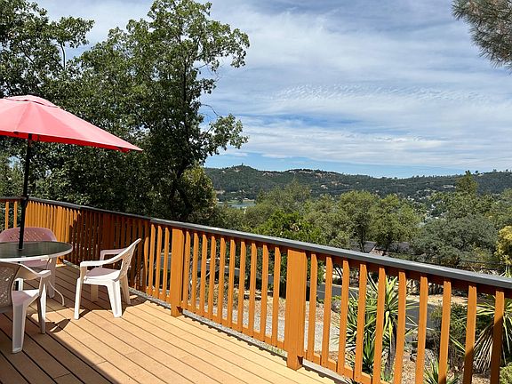 Front deck with peek of lake view, short walk to lake