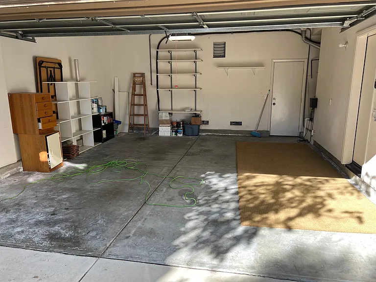 2 car garage with shelving