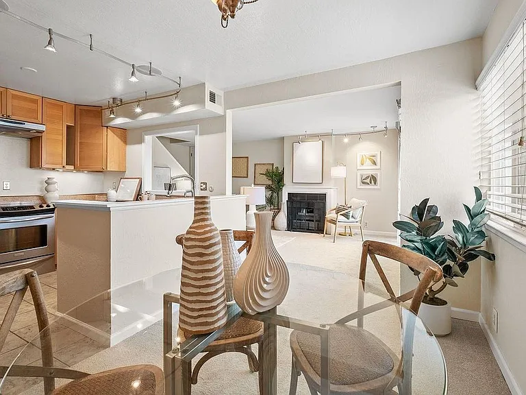 Open floor plan with living room, dining room and kitchen.