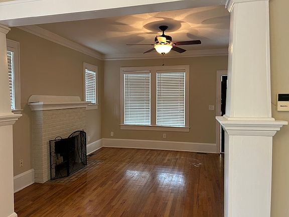 Comes in the Front Door to Living Room with Fireplace