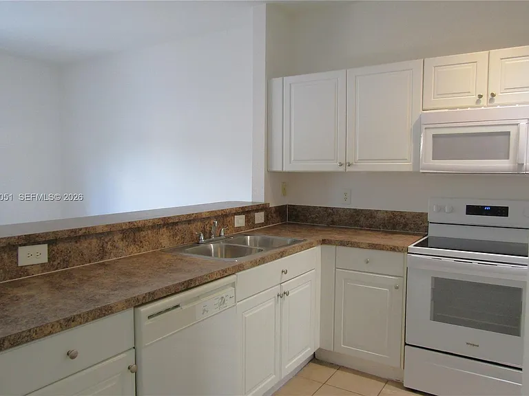 1485 NE 33rd Rd #101-1 — Photo 12