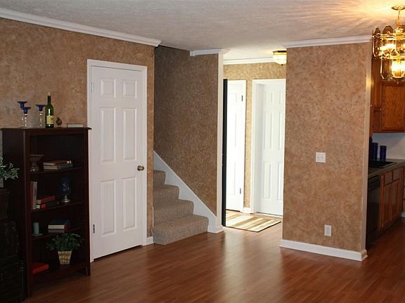 Living Room opens up into Entryway and Kitchen Area! 