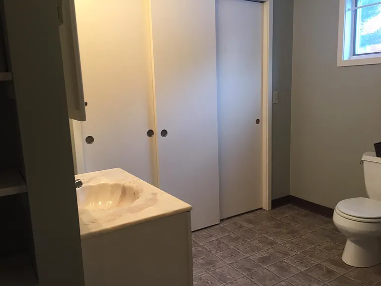 Full bath downstairs, laundry in closet.