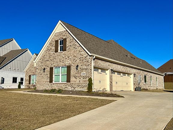 3-Car Garage, each door equipped with openers