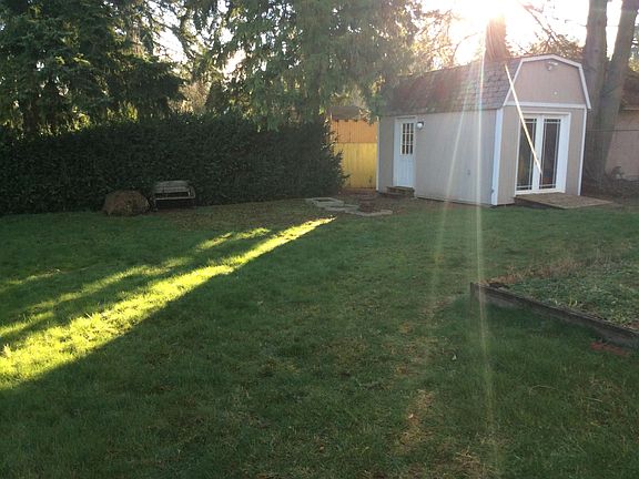A 10 x 16_ shed insulated and heated, 8,500 sqft level lot with a 12 x 20_ raised garden
