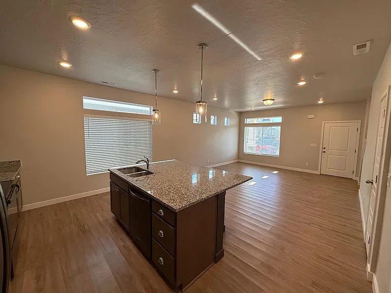 Large kitchen island. Large open living room.