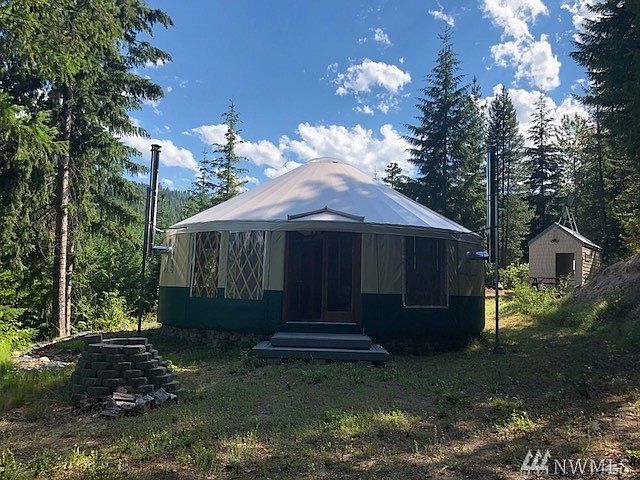 Yurt looking south modular shed in back ground.