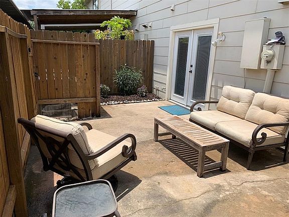 This delightful patio is accessed from the first floor study/bedroom which has a full bath.