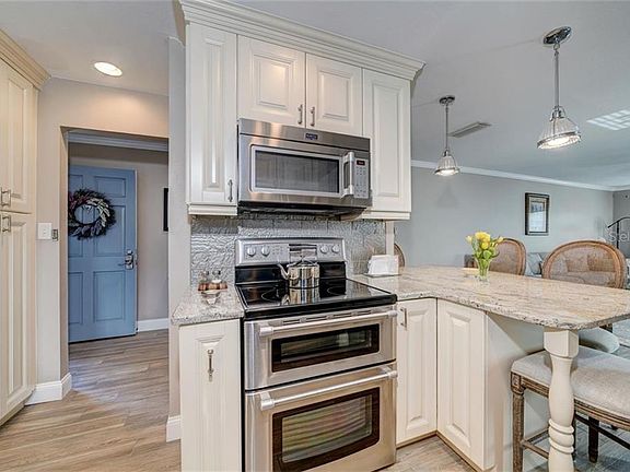5th image of 1706 Belleair Forest Dr APT 302