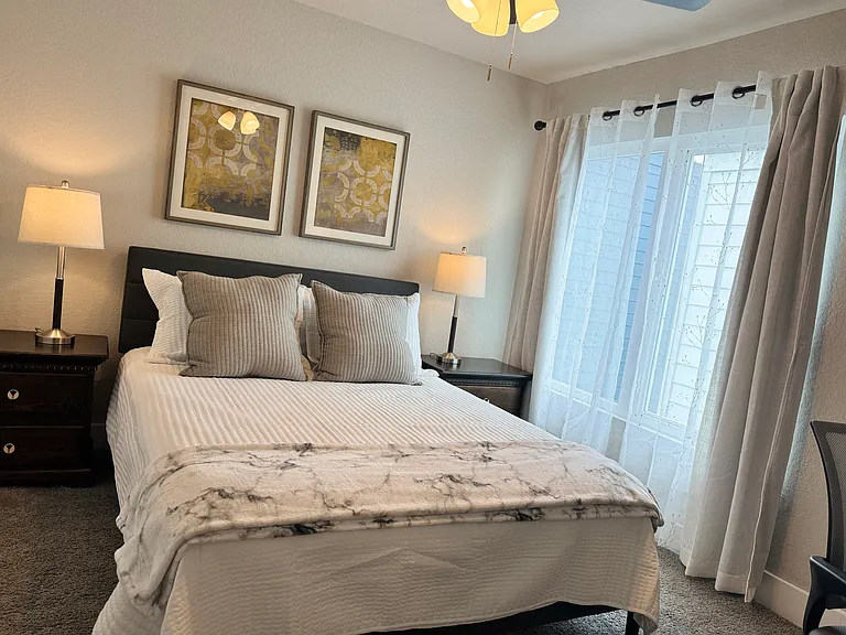Bedroom 3 features a queen bed, spacious closet, and desk/chair, along with private ensuite bathroom