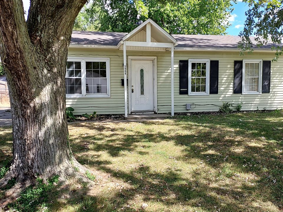 Street view of home and shade trees