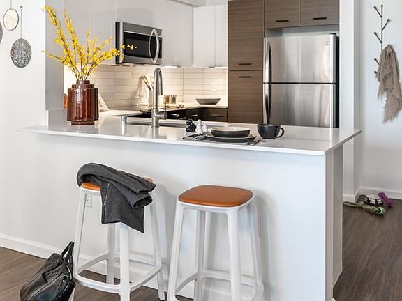 Breakfast bar and attached kitchen