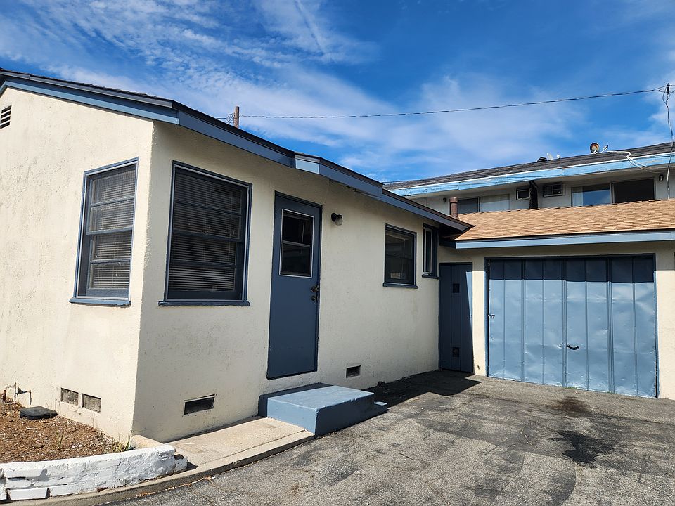 Other side of house and garage