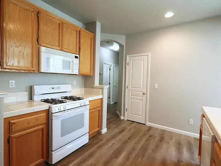 Kitchen with appliances and ample cabinets and counter space