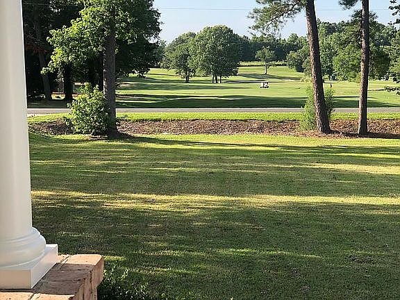 view of 9th hole across st.