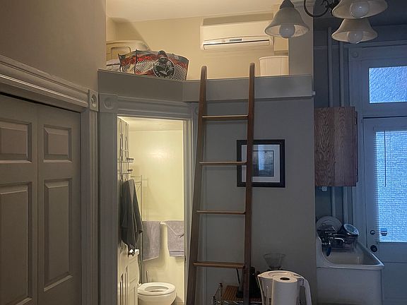 Super efficient split system AC vents up in the loft for cool sleeping on hot summer nights. Clothes closet to the left of the bathroom door.