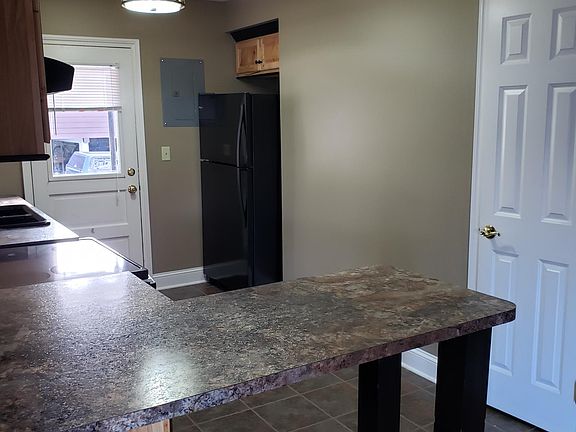 Kitchen from Livingroom, with location of back door