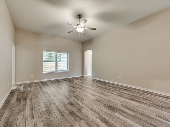 The family room offers great natural light and soaring ceilings.