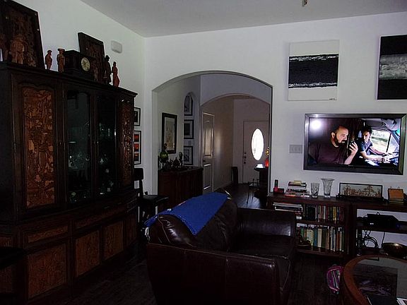 Living room open to Kitchen and Dining