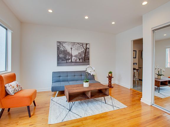 Bright Living Room - with Dining Area in Background