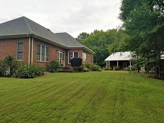 Back of house & 2nd bldg 