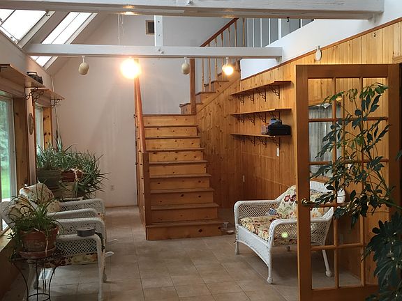 Sunroom stairs to loft
