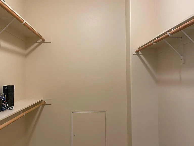 Large walk-in closet offering exceptional storage and organization.
