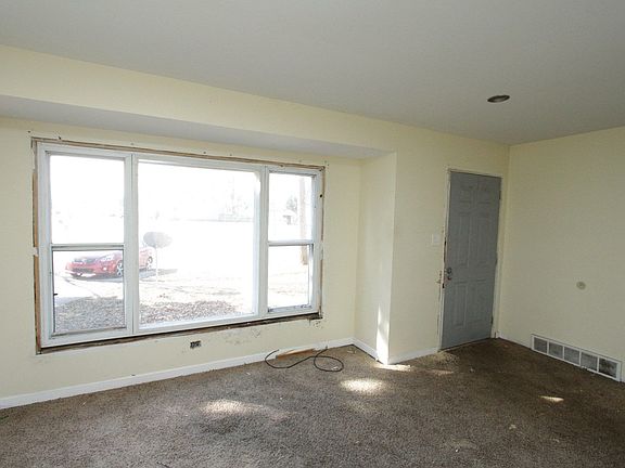 WINDOW BESIDE THE ENTRY DOOR