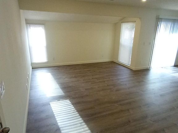 Large open floor plan living-dining area.