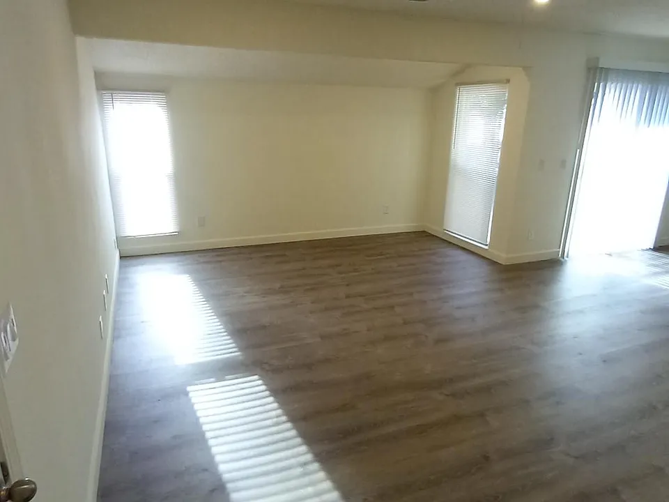 Large open floor plan living-dining area.