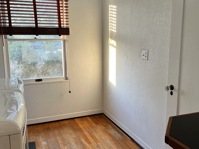 laundry with view of pantry door