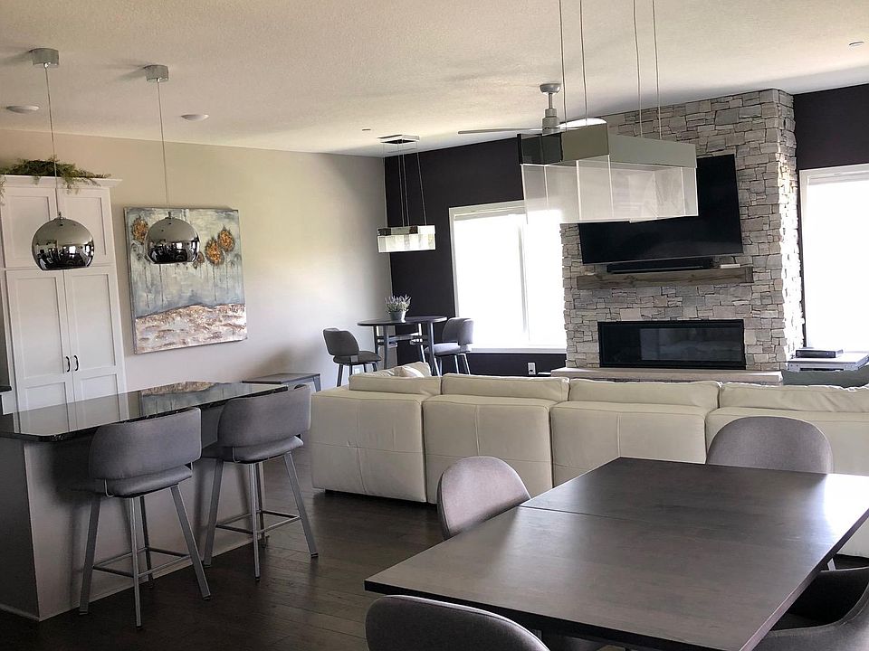 Open concept living room, dining room, and kitchen