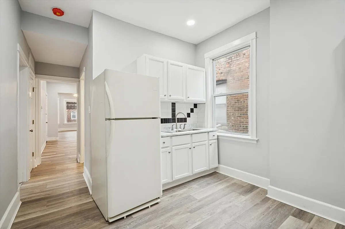 Building Photo - 6338 S Ada St #1