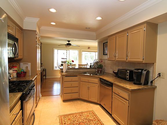 Upgraded cabinets and custom granite countertops! 