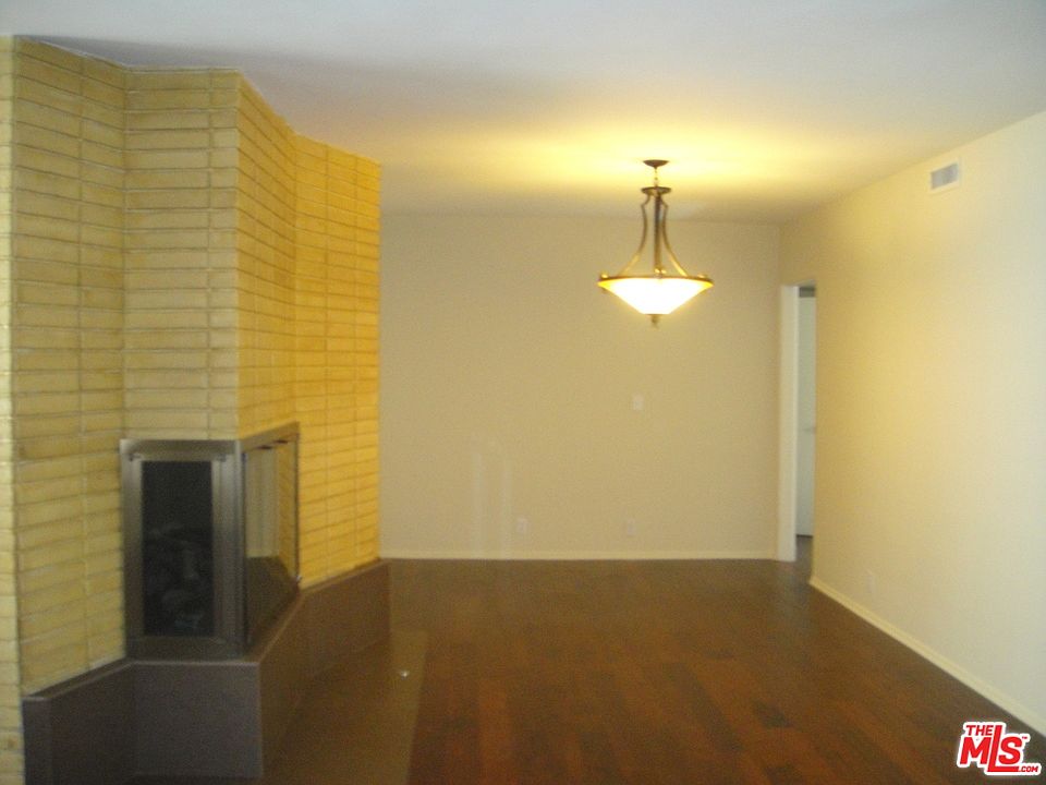 1st image of 415 N Palm Dr APT 302