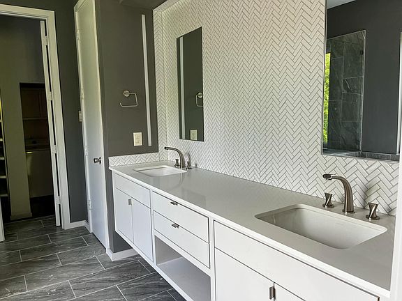 Double vanities and bright morning light.