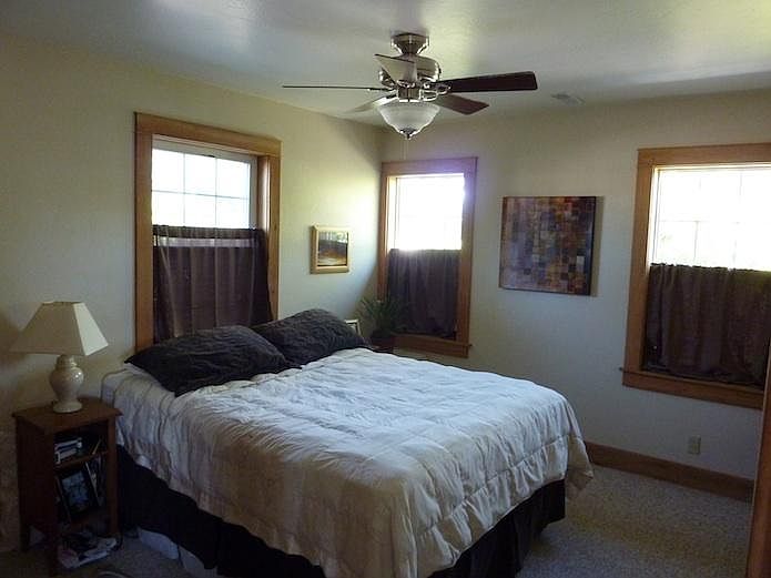 Bedroom shown furnished.