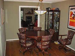 The dining room is open to the den to provide excellent flow for entertaining and access to the kitc