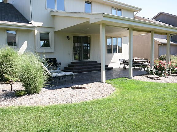 Covered Patio & Great Landscaping