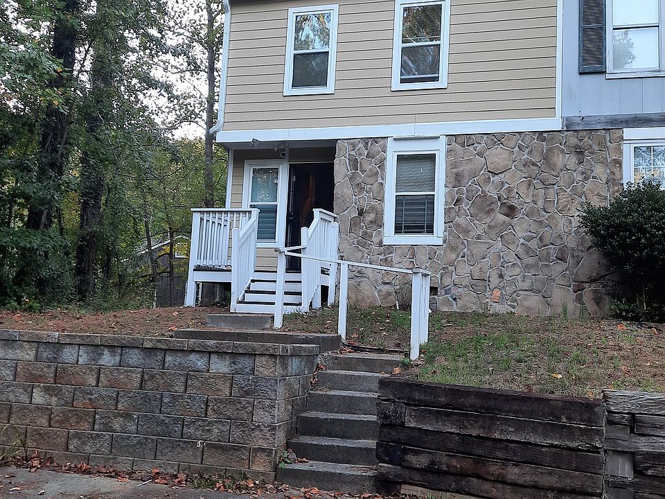 Townhouse front view with two private parking spaces